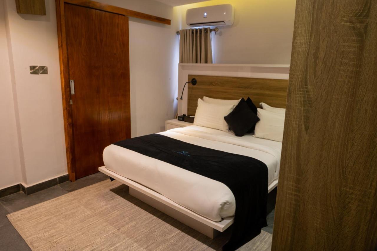 Villa Monument Hotel Aliayabiagba Ngoại thất bức ảnh