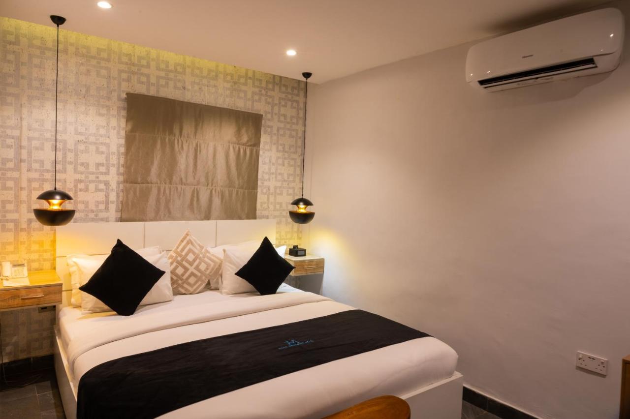 Villa Monument Hotel Aliayabiagba Ngoại thất bức ảnh
