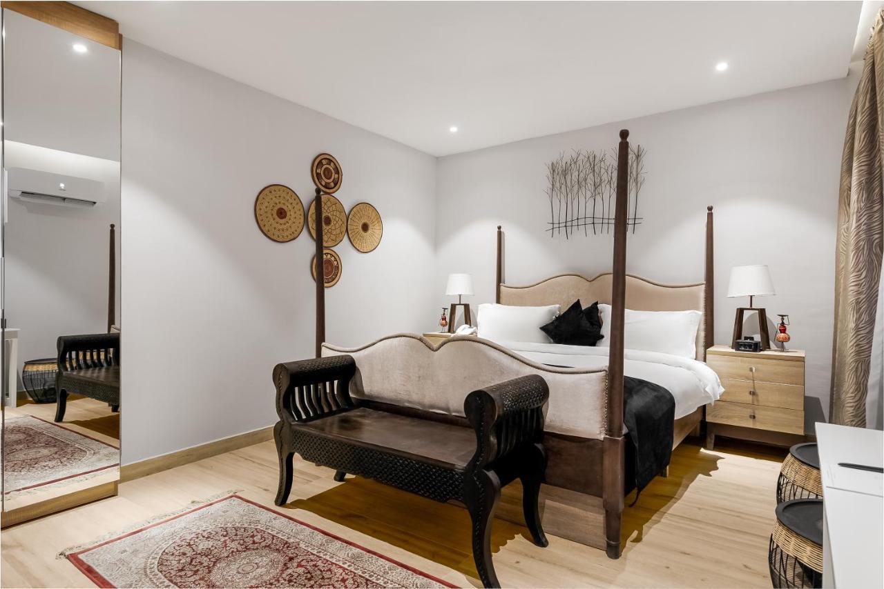 Villa Monument Hotel Aliayabiagba Ngoại thất bức ảnh