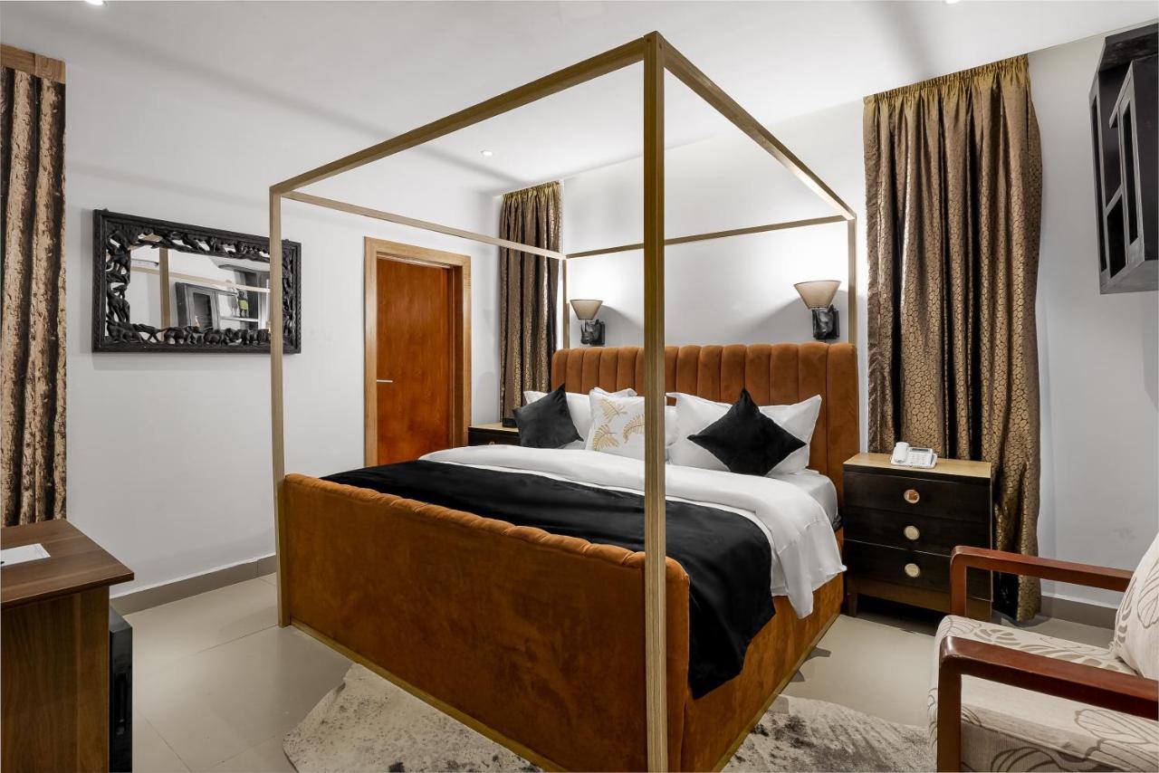 Villa Monument Hotel Aliayabiagba Ngoại thất bức ảnh